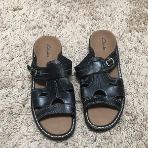 New Clark’s black leather sandals